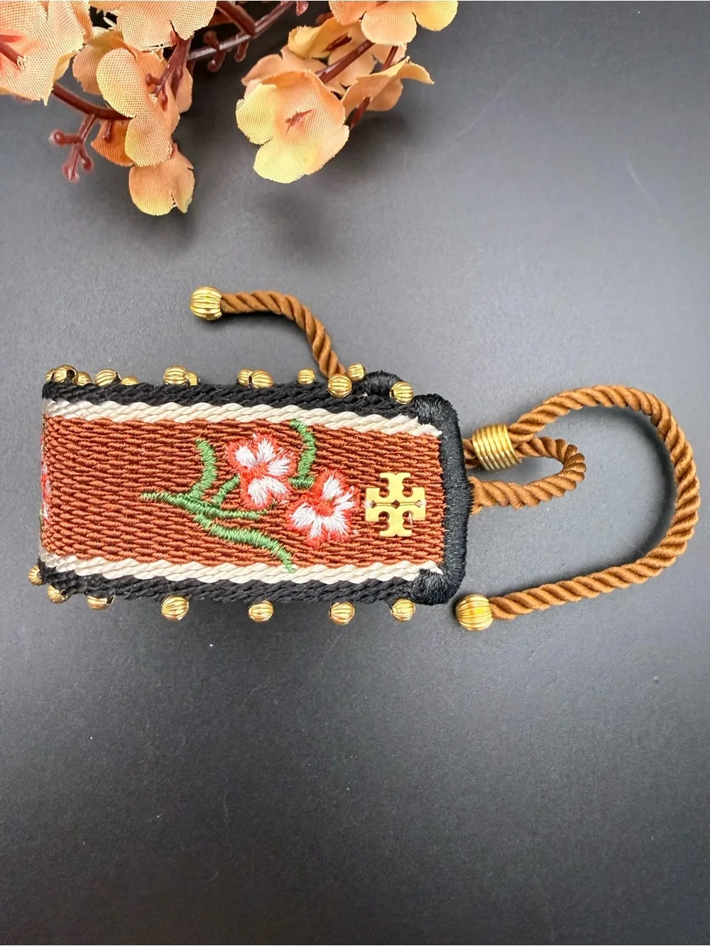 Tory Burch Rust Brown Embroidered Floral Rope Bracelet with Gold Logo